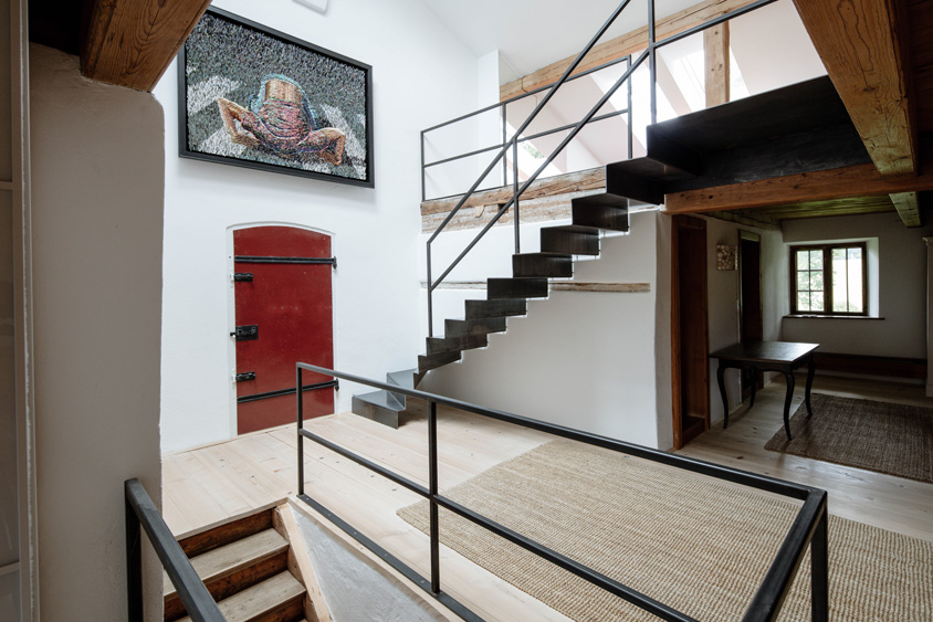 Faltwerktreppe aus Stahl im Altbau