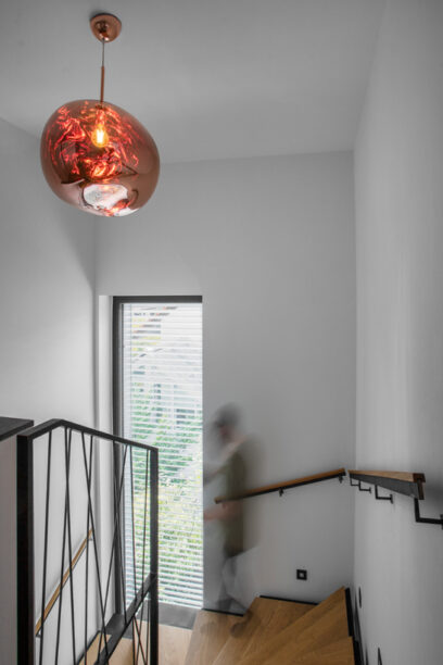 Faltwerktreppe mit Holzbela und Geländerharfe